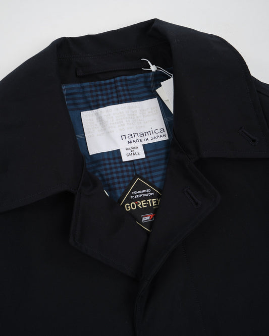 Mastering the Art of Versatility: The Nanamica GORE-TEX Balmacaan Coat - Meadow